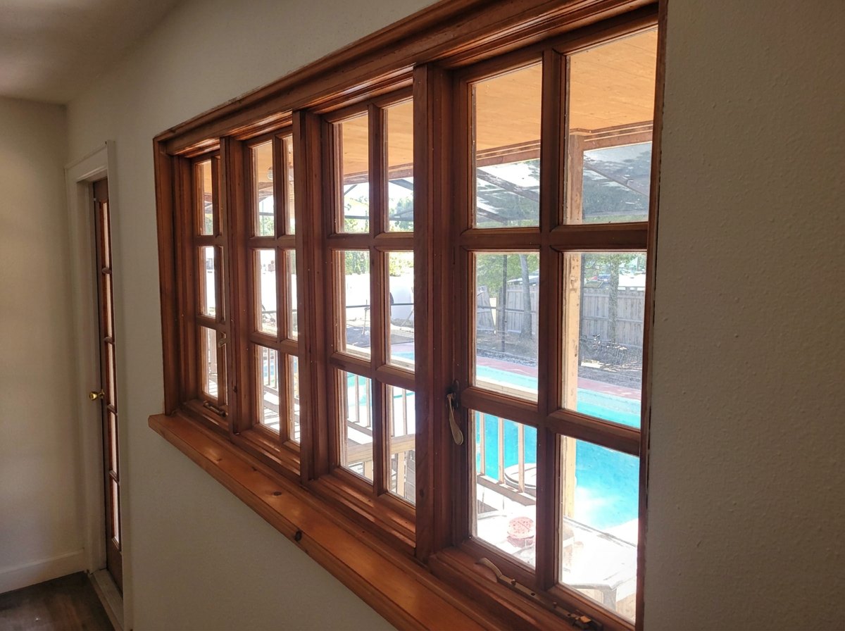 Wood window trim before painting — 170 Velma Dr W, Largo, FL